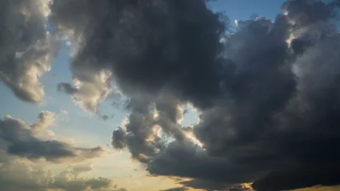 Beautiful sky with dark blue clouds background, Clouds at sunset. Sky with cloud Stock Footage 156937936