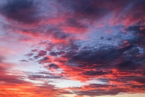 Beautiful sky with dramatic clouds on sunset. Stock Photos