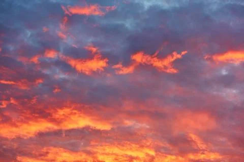 Beautiful sky with dramatic red orange clouds at sunset Stock Photos