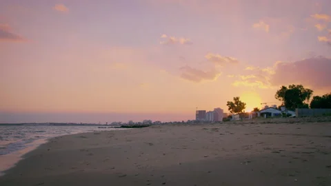 Beautiful sky during sunset over a deserted beach, camera tracking Stock Footage 237931981