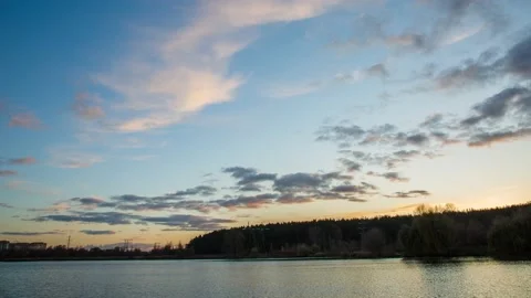 Beautiful sky during sunset, river, time laps Stock Footage 143804638