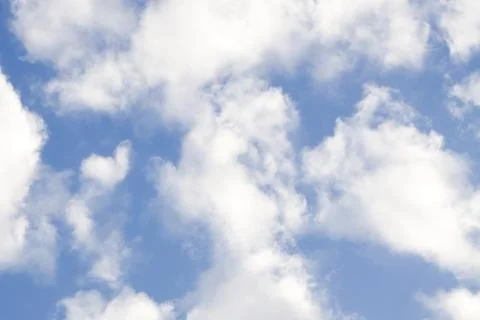 Beautiful sky with fluffy clouds,frame framing clouds . Stock Photos