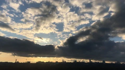 Beautiful sky with gray clouds on the sunset. TimeLapse. Clouds over the city Stock Footage 170186077