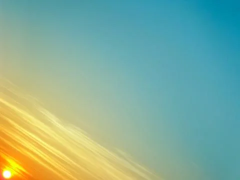 Beautiful sky with linear clouds at sunset time Stock Photos