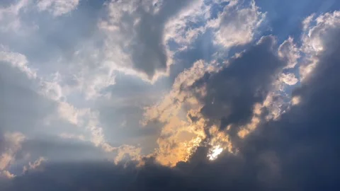 Beautiful sky with sunbeams breaking through clouds 스톡 동영상 341894429