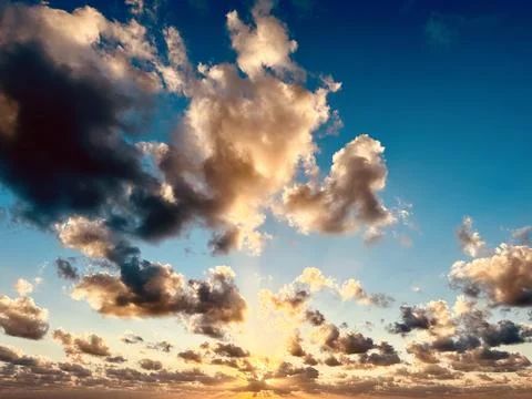 Beautiful sky on sunset with clouds Stock Photos