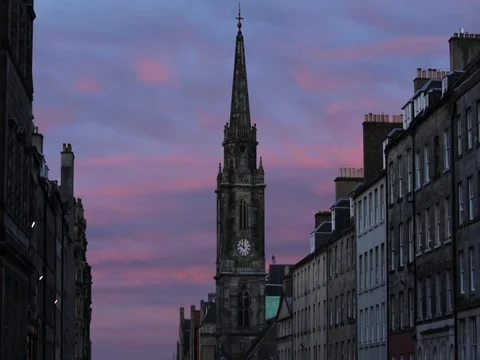 Beautiful sky at sunset in Edinburgh. Tron Kirk clock tower, Royal Mile. Stock Footage 72546385