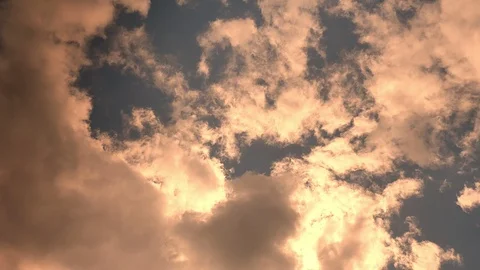 Beautiful sky, sunshine appearing from the clouds, brown tones, amazing nature Video stock 97725834
