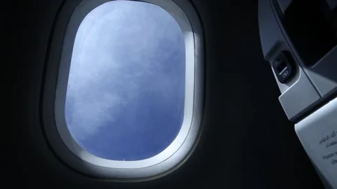 A beautiful sky view and sunlight changing it angle while aircraft turning Stock Footage 131357252