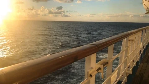 Beautiful skyline sunset from deck of ship panning down Stock Footage 97179477