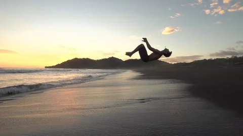 Beautiful Slow Motion Sunset Flips Stock Footage 87723571