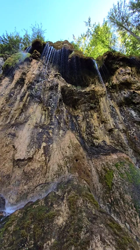 Beautiful slow motion video of Cascada Pisoaia waterfall Stock Footage 318433611
