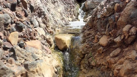 Beautiful small waterfall Stock Footage 153164958