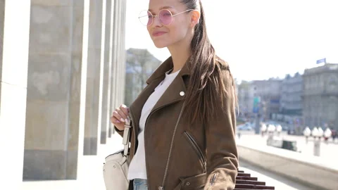 Beautiful smiling brunette model dressed in summer hipster jacket 動画素材 140994173