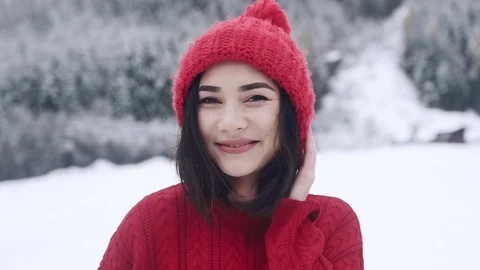 A beautiful smiling girl posing for a camera Stock Footage 82802235
