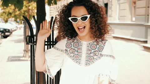 Beautiful smiling model with afro curls hairstyle Stock Footage 141521995