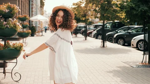 Beautiful smiling model with afro curls hairstyle Stock Footage 141523103