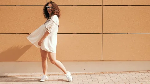 Beautiful smiling model with afro curls hairstyle Stock Footage 141525715