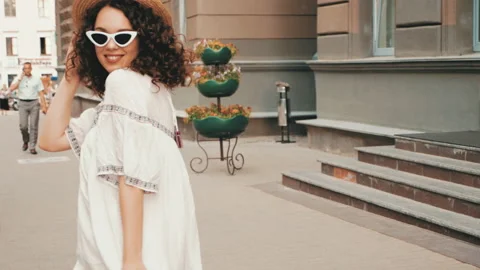 Beautiful smiling model with afro curls hairstyle Stock Footage 141528122