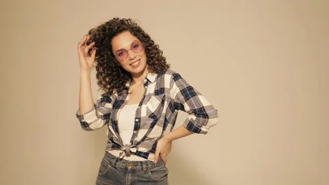 Beautiful smiling model with afro curls hairstyle Stock Footage 142223218