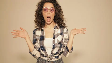 Beautiful smiling model with afro curls hairstyle Stock Footage 142223554