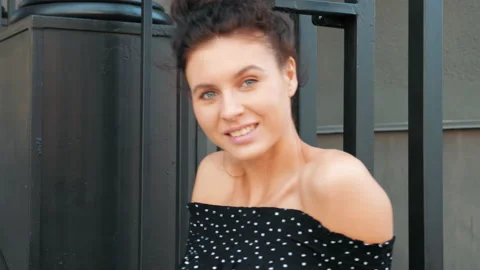 Beautiful smiling model dressed in elegant summer clothes 動画素材 141903782