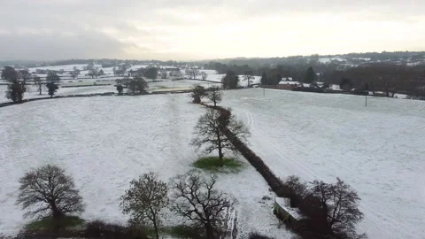 Beautiful Snow Covered Fields Winter Scene 2.7k Stock Footage 148038382