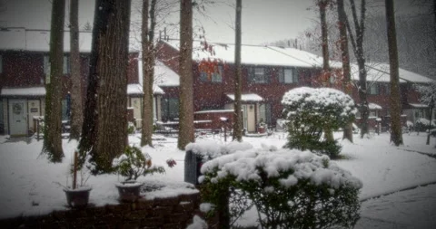 Beautiful Snow Fall in Small Forest Community Stock Footage 267864495