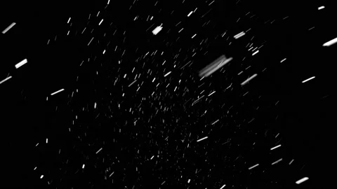 Beautiful snow falling softly from the sky, isolated on the black background. Stock Footage 147689632
