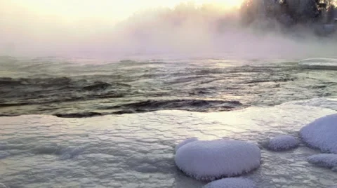 Beautiful snow. Sunset in the winter . Rough River. The snow sparkles . 스톡 동영상 62094267