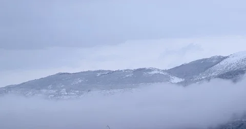 Beautiful snowcapped mountains during winter Stock Footage 89974643