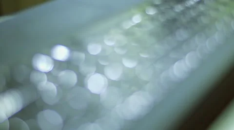 Beautiful soft focus shot of a black keyboard with lights on Stock Footage 64217181