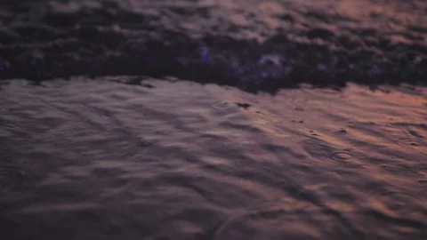 Beautiful soft focus surface of sea ocean wave with rays of sun at sunset dawn Stock-Footage 129482551