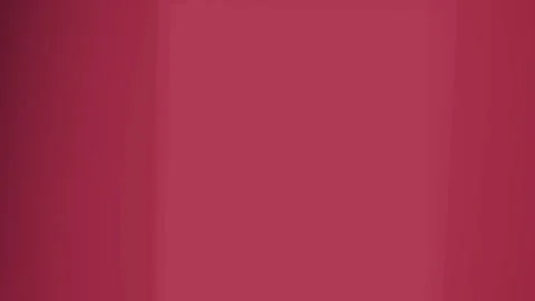 A beautiful solid shade of crimson creates a soft and modern gradient background Stock Footage 311880696