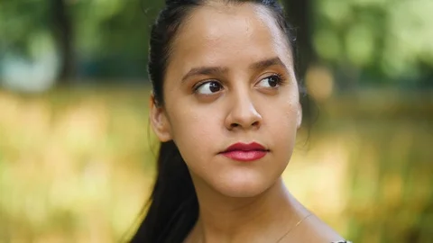 Beautiful Spanish Woman's Face in a Park Video stock 90796889