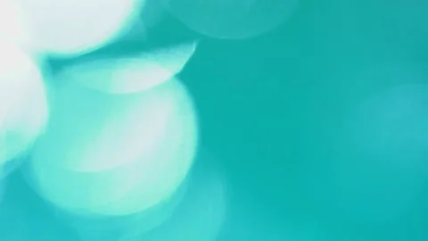 Beautiful sparkling shiny texture of blurry blue water with sun reflected on Stock Footage 133153767