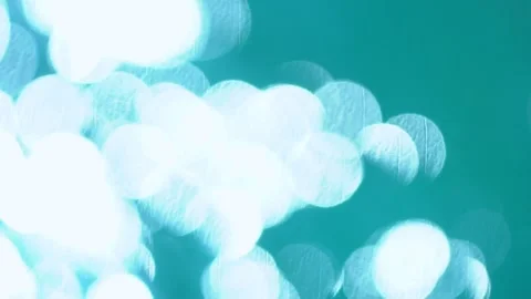 Beautiful sparkling shiny texture of blurry blue water with sun reflected on Stock Footage 135402860