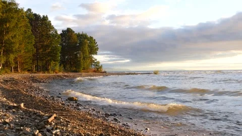 Beautiful sparkling waves roll onto the shore. Stock Footage 285381189
