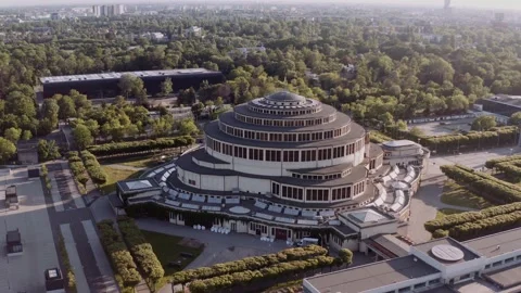 Beautiful, spherical building during sunset. Interesting architecture aerial. Stock Footage 145991871