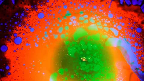 Beautiful spinning liquid pattern in motion Stock Footage 127714979