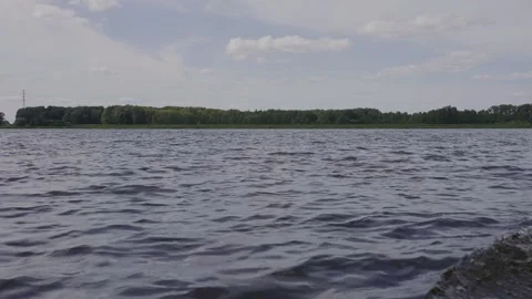 Beautiful splashes and marks on the water from a motorboat Video stock 329248570