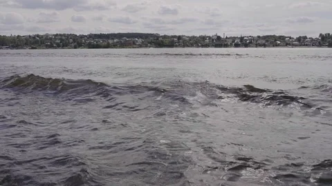 Beautiful splashes and marks on the water from a motorboat Stock Footage 329248579