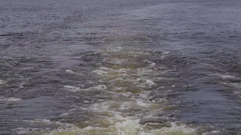 Beautiful splashes and marks on the water from a motorboat Stock Footage 329248605