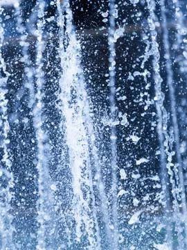 Beautiful splashes on a blue background Stock Photos