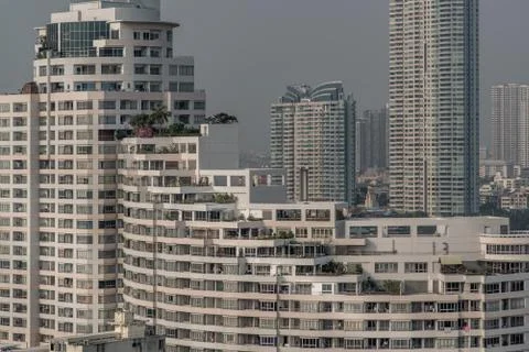 Beautiful Split-level Condominiums with intersecting levels with blue sky at Stock Photos