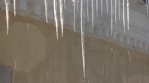 Beautiful spring comes with dripping icicles, melting Icicles, Stock-Footage 102963747