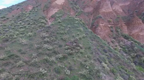 Beautiful spring landscape of rocks and green mountains. Kazakhstan. Stock Footage 62255393
