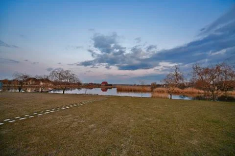 Beautiful spring sunset on the river. Stock Photos