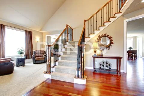 Beautiful staircase with wood and iron railings Stock Photos