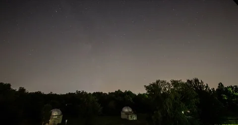 Beautiful Star Trails Night Sky near the Highway. Stock Footage 69939905